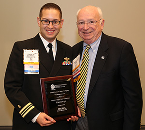 Radhames E. Lizardo, MD, accepting the Runner Up award