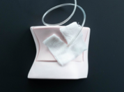 Place the split gauze around the tubing where the drain enters your body.